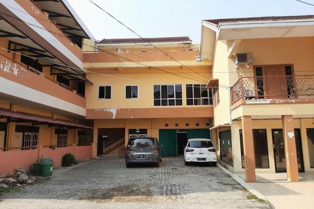 Oyo 2025 Wisma Musdalifa Palembang Extérieur photo